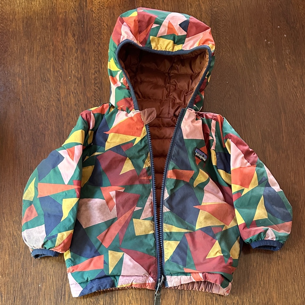 Reversible puffer jacket with hood